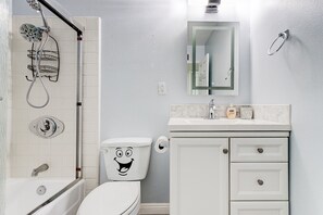 Combined shower/bathtub