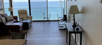 floor to ceiling windows,180 degree view of ocean, 11th floor