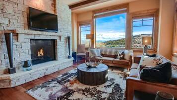 Luxury Condo | Living area | 40-inch flat-screen TV with digital channels, TV, fireplace