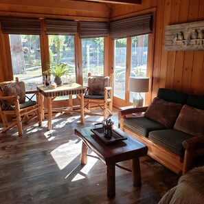 Romantic Studio Suite | Living area | 50-inch LCD TV with cable channels - Grey Squirrel Resort (Big Bear Lake)