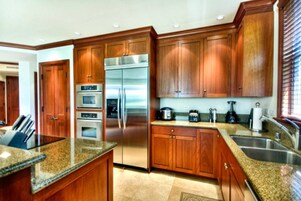 Luxury Villa (Unit 11A) | Private kitchen | Full-size fridge, microwave, oven, stovetop