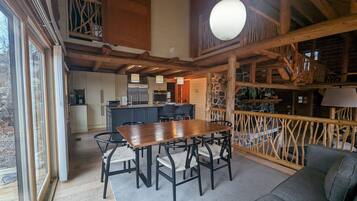 Premium Cabin | Private kitchen | Fridge, coffee/tea maker, high chair, dining tables