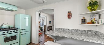 Downtown Green Gable Bungalow with AC, Fully Fenced Yard, W/D, 2 Smart TVs, WiFi