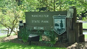A welcome sign for Manchester State Park with a Washington State Parks logo. - Water view high bank two bedroom private border Manchester State Park. (Port Orchard)