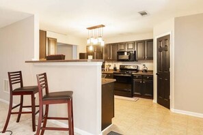 Fridge, microwave, oven, stovetop - Stylish &Spacious 5BD Home w/ a Spa-Like Suite 22min from DT Atlanta! (Atlanta)