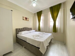 Standard Double or Twin Room, Garden Area | Free WiFi, bed sheets - Düsseldorf Pansiyon (Kusadasi)