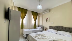 Standard Double or Twin Room, Garden Area | WiFi (free), bed sheets - Düsseldorf Pansiyon (Kusadasi)