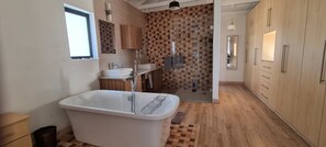 Bathtub, hair dryer, towels