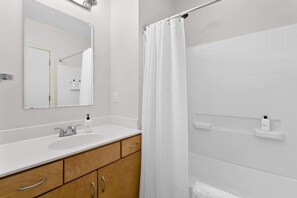 Shower, hair dryer, shampoo - Historic Whiskey Row Lofts in Heart of Downtown (Louisville)