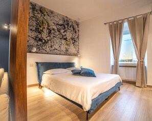 普通套房, 1 張特大雙人床和 1 張沙發床, 海景 | 高級寢具、羽絨被、記憶床墊、免費迷你吧物品