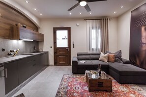 Royal Suite | Living area | 42-inch Smart TV with satellite channels, TV, Netflix - utopia luxury suites (Rhodes)