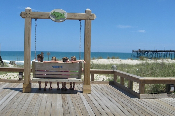 Kure Beach Bench Swing - perfect place to relax and enjoy the sunsets.