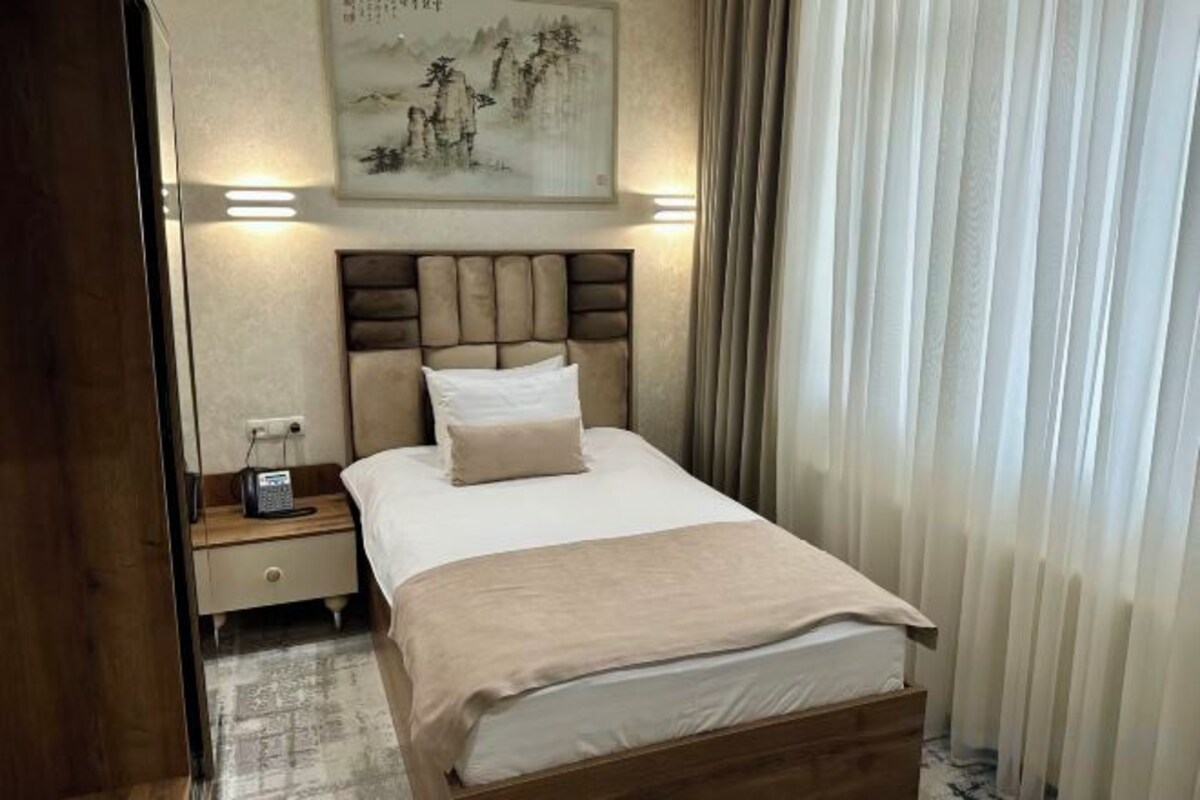 Hochwertige Bettwaren, Daunenbettdecken, Tempur-Pedic-Betten, Minibar