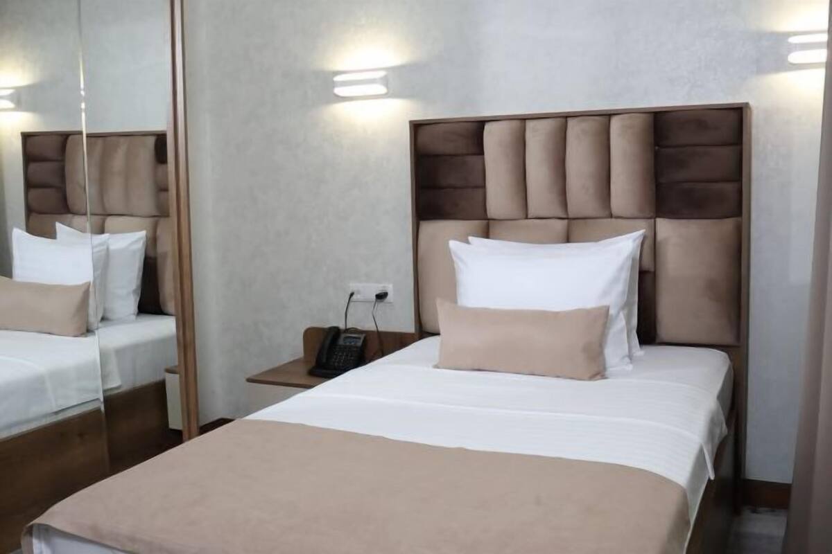 Premium bedding, down comforters, Tempur-Pedic beds, minibar