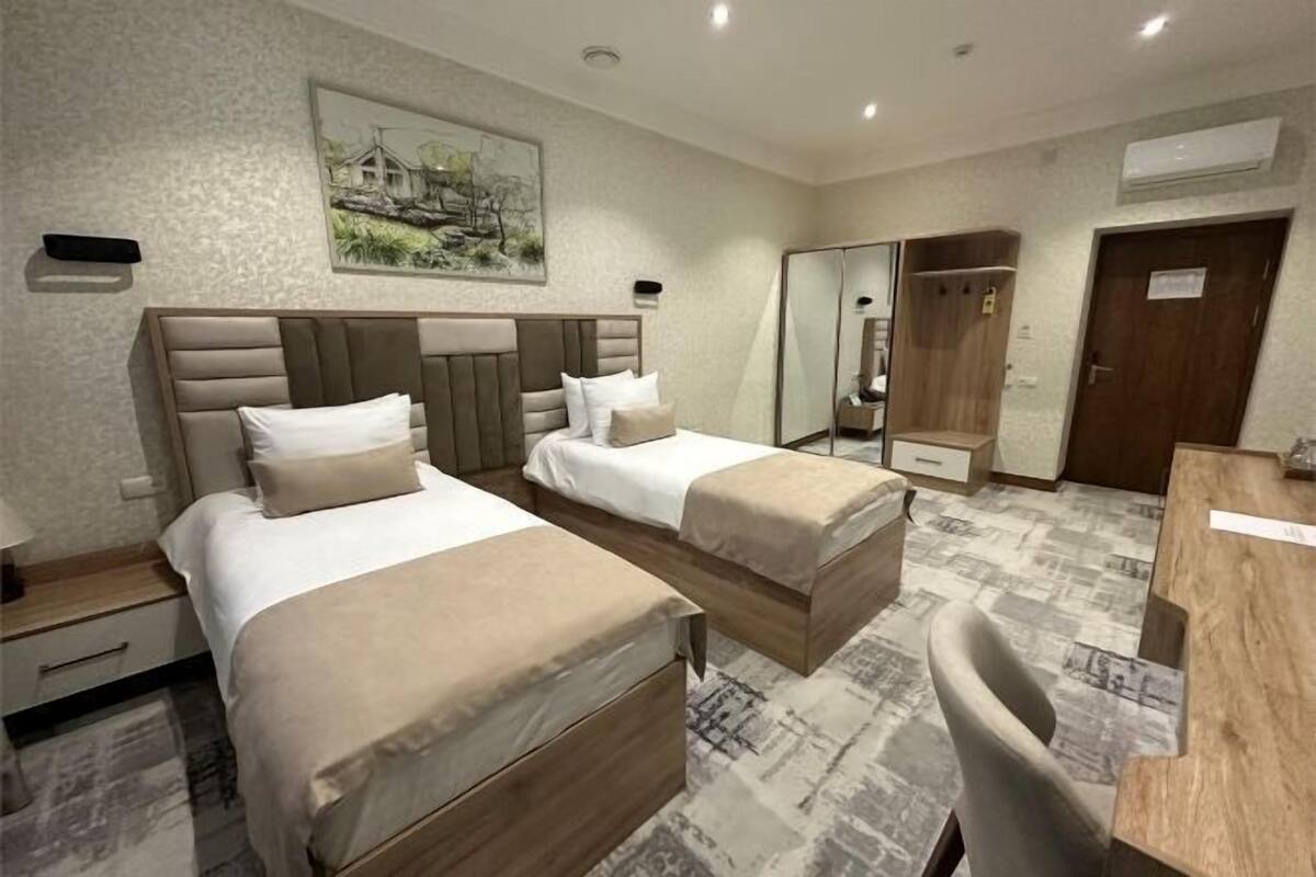 Premium bedding, down comforters, Tempur-Pedic beds, minibar