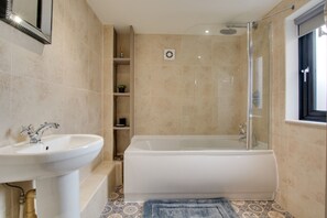 House | Bathroom | Combined shower/tub, deep soaking tub, hair dryer, towels - Chestnut Barn Runham 1880's Barn Conversion (Great Yarmouth)