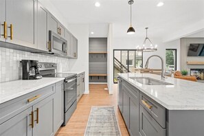 Fridge, microwave, oven, stovetop - Modern 4 Bed/3.5 Bath Farmhouse Steps to Downtown CF! (Cedar Falls)