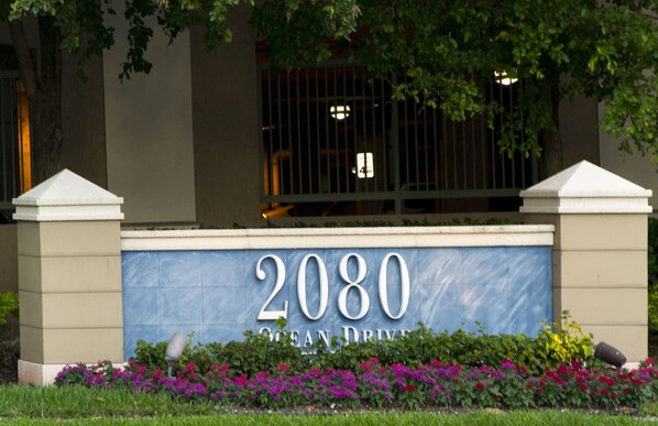 A building entrance with a sign reading "2080 Ocean Drive." - BEACHFRONT LUXURIOUS CONDO (Hallandale Beach)
