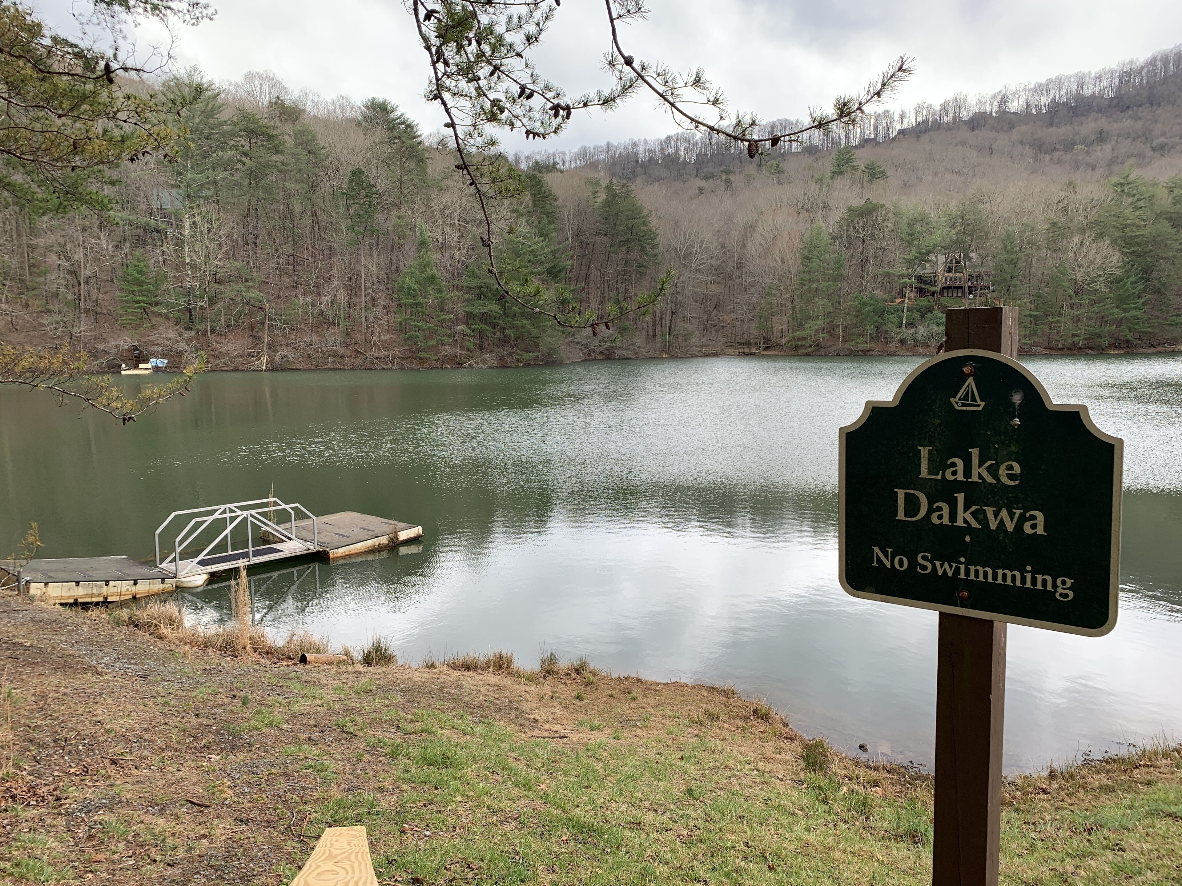 A sign for Lake Dakwa with a no swimming warning.