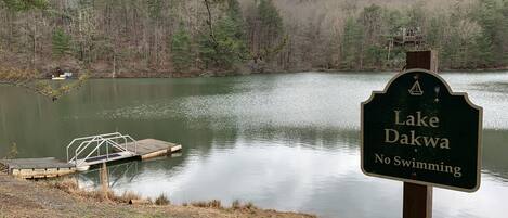 A sign for Lake Dakwa with a no swimming warning.