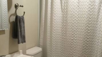 Combined shower/tub