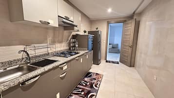 Fridge, oven, spices, dining tables