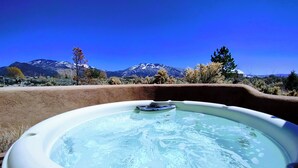 A hot tub with a mountain view. - Sweeping panoramic mountain views, expansive adobe privacy wall system (Arroyo Seco)