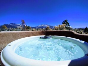 A hot tub with a mountain view. - Sweeping panoramic mountain views, expansive adobe privacy wall system (Arroyo Seco)