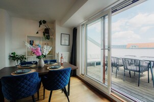 *Rooftop* 2-Room Apartment with Kitchen and Terrace | Living area | 32-inch TV with cable channels