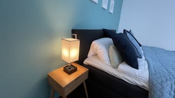 1 bedroom, desk, iron/ironing board, travel cot