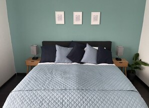 1 bedroom, desk, iron/ironing board, travel crib