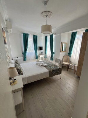 Habitación Confort doble, vistas al jardín | Ropa de cama