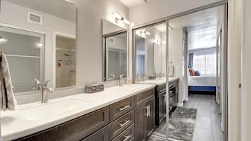 Combined shower/tub, hair dryer, towels, soap