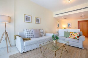 Luxury Apartment, 1 King Bed with Sofa bed, Balcony, Pool View | Living area