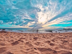 On the beach, sun-loungers, beach towels