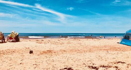 Renovated family cottage; walk to amazing beach, short drive to golf & town