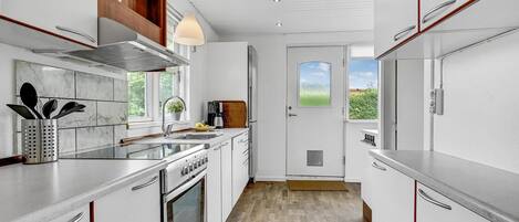 Fridge, stovetop, dishwasher, coffee/tea maker