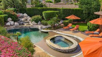 Outdoor pool, a heated pool, sun loungers