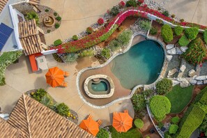 Outdoor pool, a heated pool, pool loungers