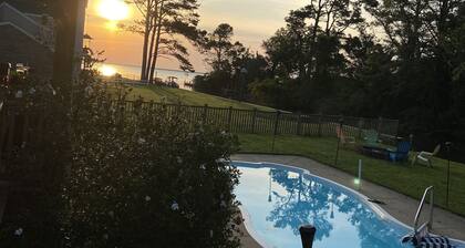 Island home on the water with pool. Bring your boat or jet skis ! Golf near by