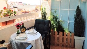 A table set for two with a view of the cityscape. - Near Lake, With View, Center (Ohrid)