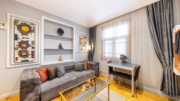 Family Quadruple Room, 1 Bedroom | Premium bedding, individually furnished, desk, laptop workspace