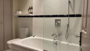 Combined shower/tub, hair dryer, towels, soap