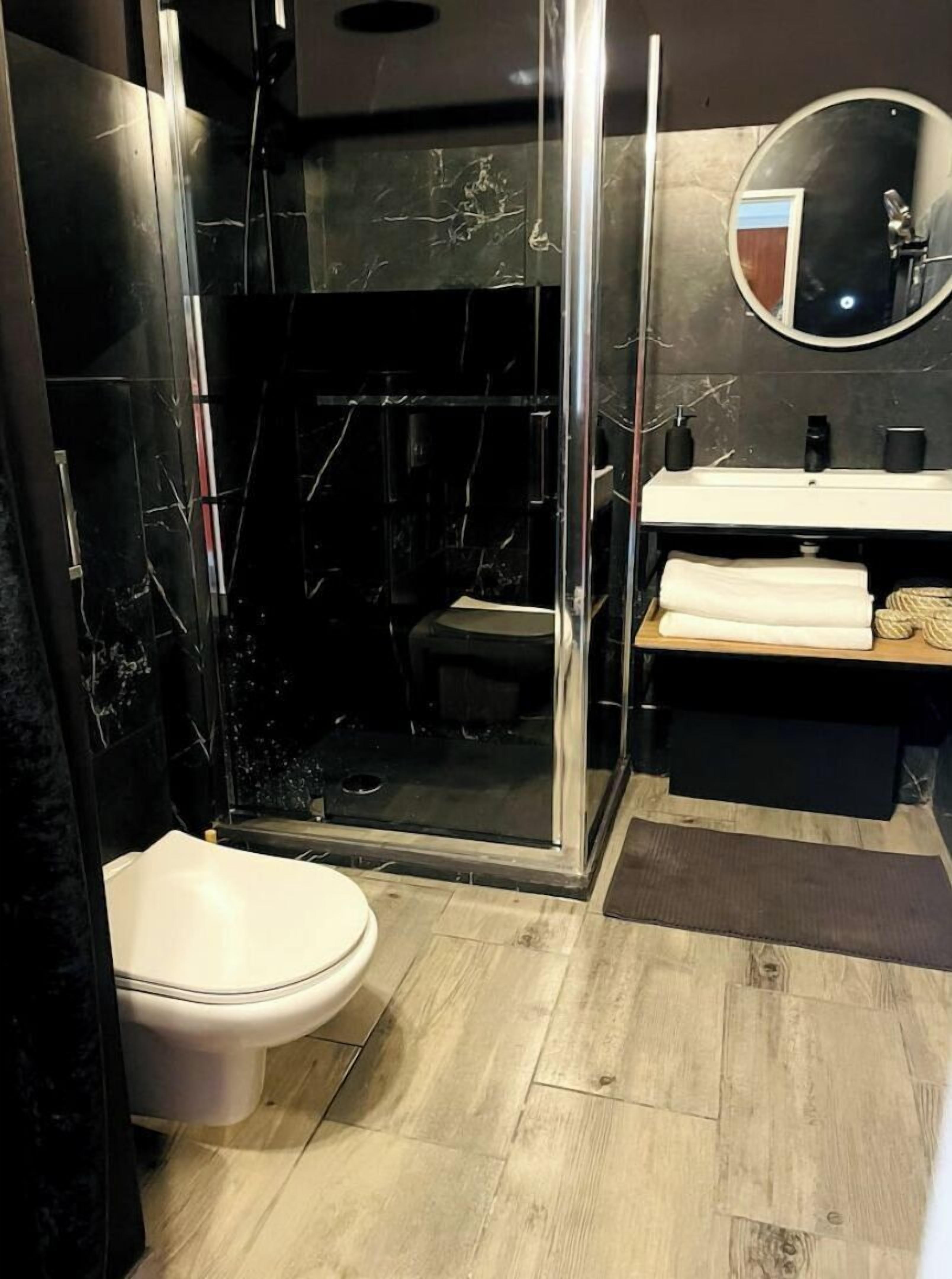 Shower, hair dryer, bathrobes, towels