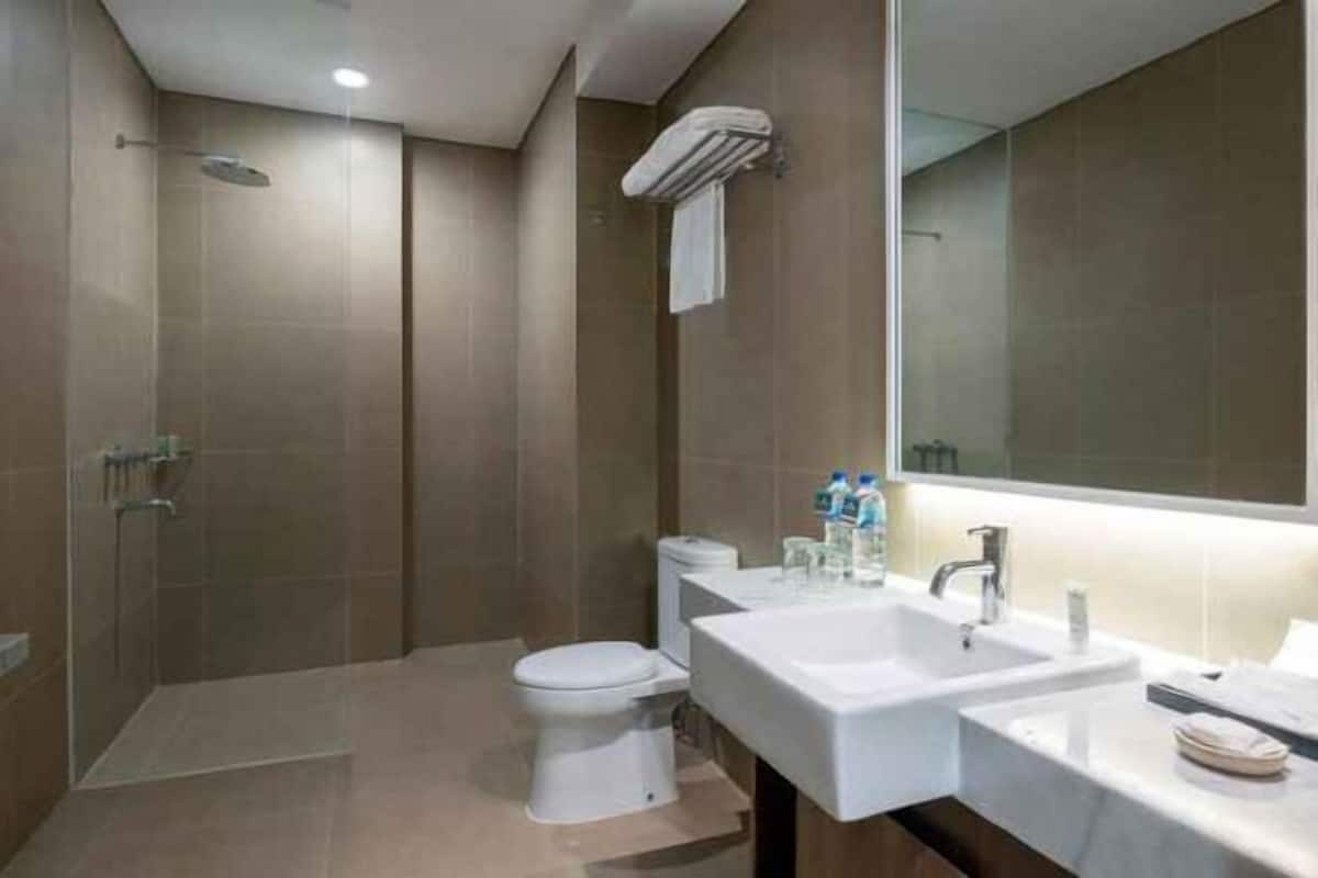 Bathroom | Shower, rainfall showerhead, hair dryer, slippers