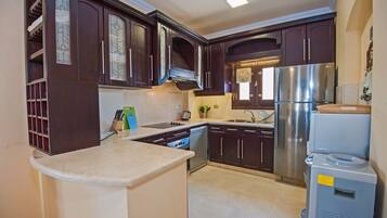 Fridge, microwave, oven, cookware/dishes/utensils