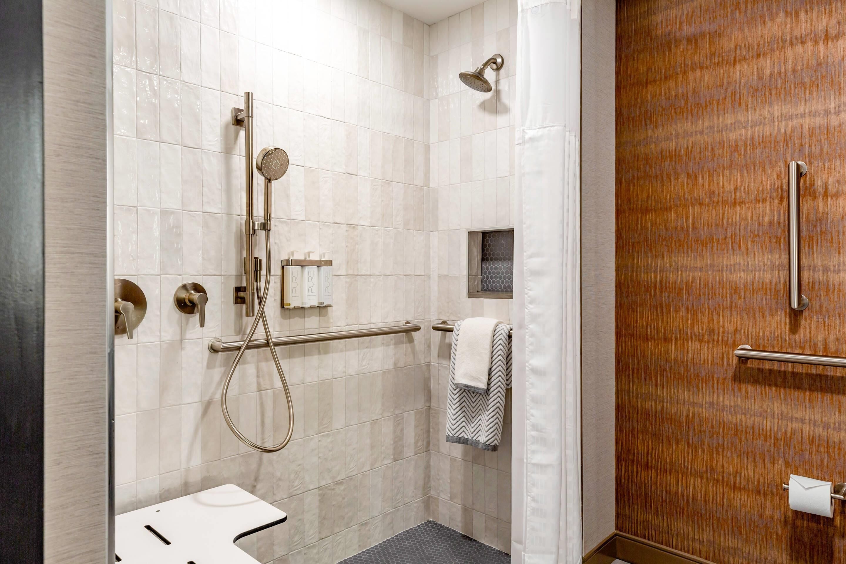 combined shower/bathtub, free toiletries, hair dryer, towels