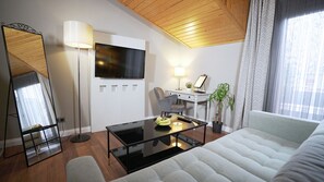 King Suite | 高档床上用品、客房内保险箱、免费 WiFi、床单