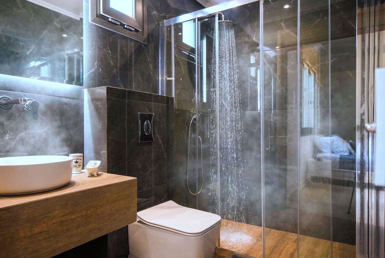 Premium Suite (Hera) | Bathroom | Hydromassage showerhead, hair dryer, slippers, towels