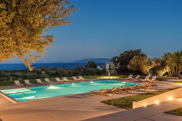 Seasonal outdoor pool, open 9:00 AM to 9:00 PM, pool umbrellas